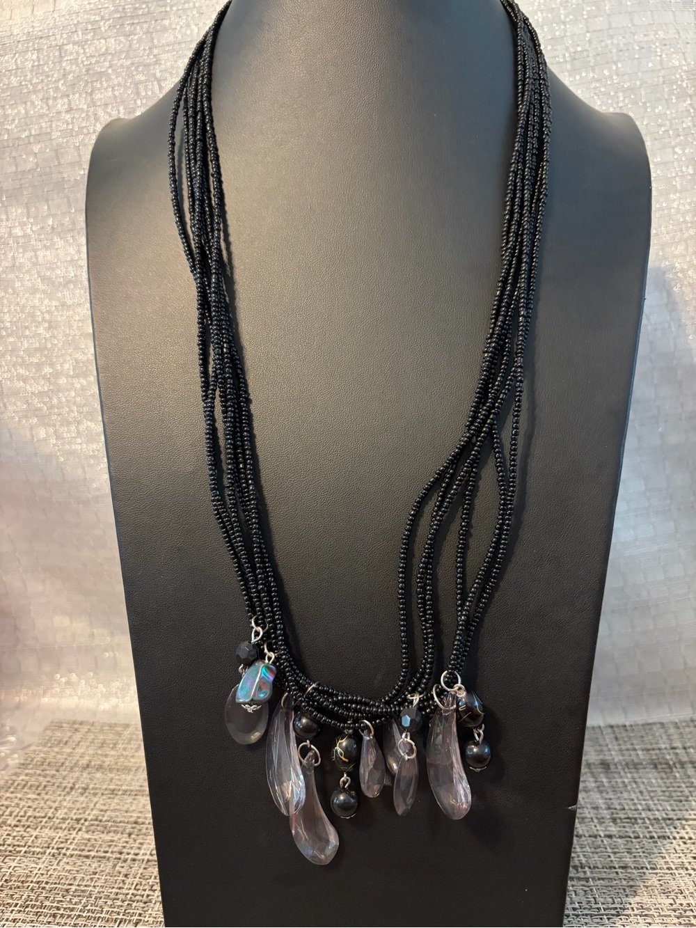 Black Multi-Strand Beaded Necklace with Iridescent Charms